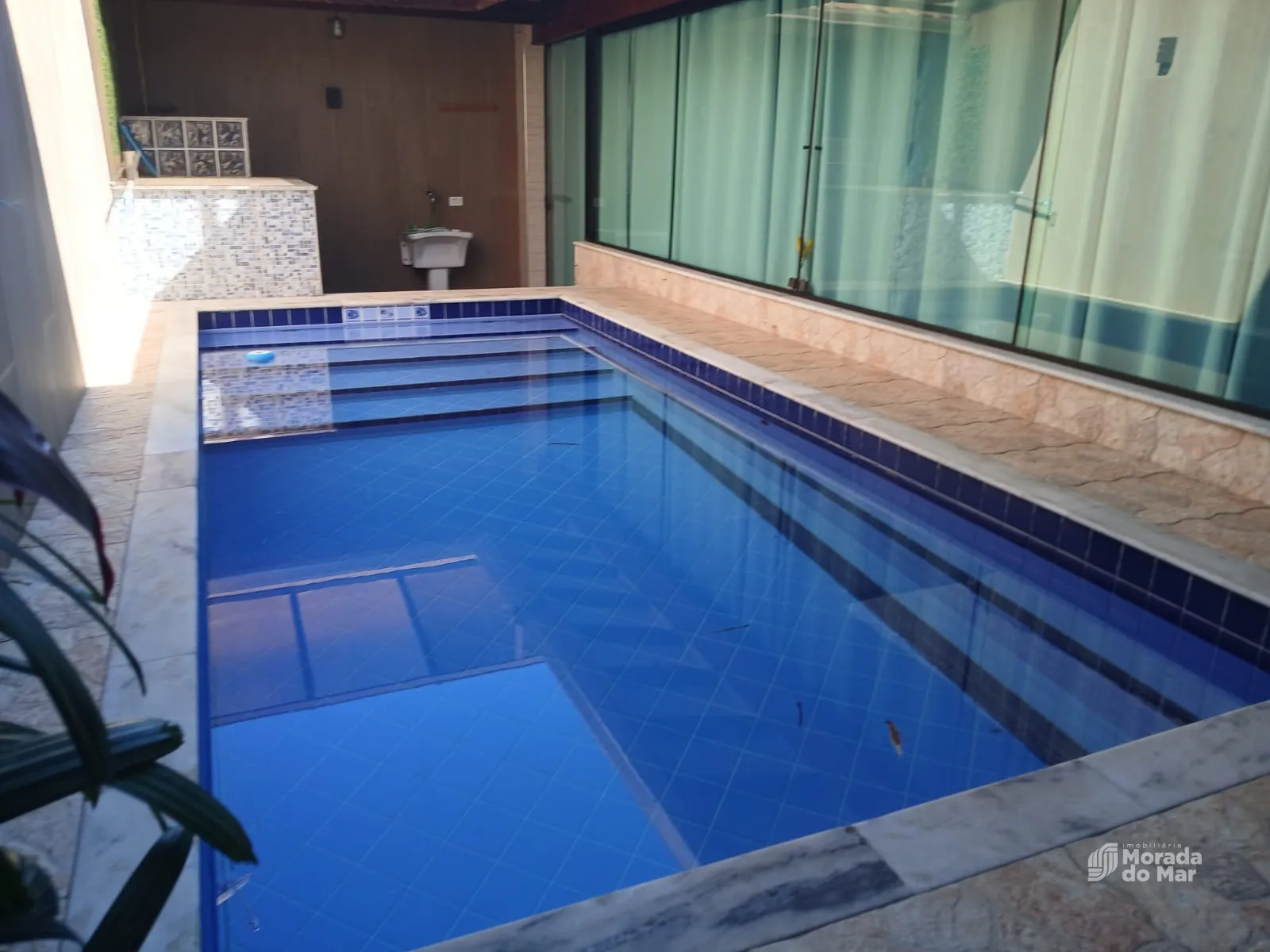 Sobrado 250 m² com 3 suítes, energia solar e piscina no Massaguaçu — foto 4